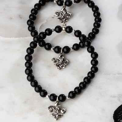 Fleur de Love Knot Protection Onyx Signature Stretch Bracelet